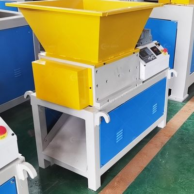 Máquina de trituração de garrafas de resíduos de plástico mini Triturador de eixo duplo para eficiência de reciclagem